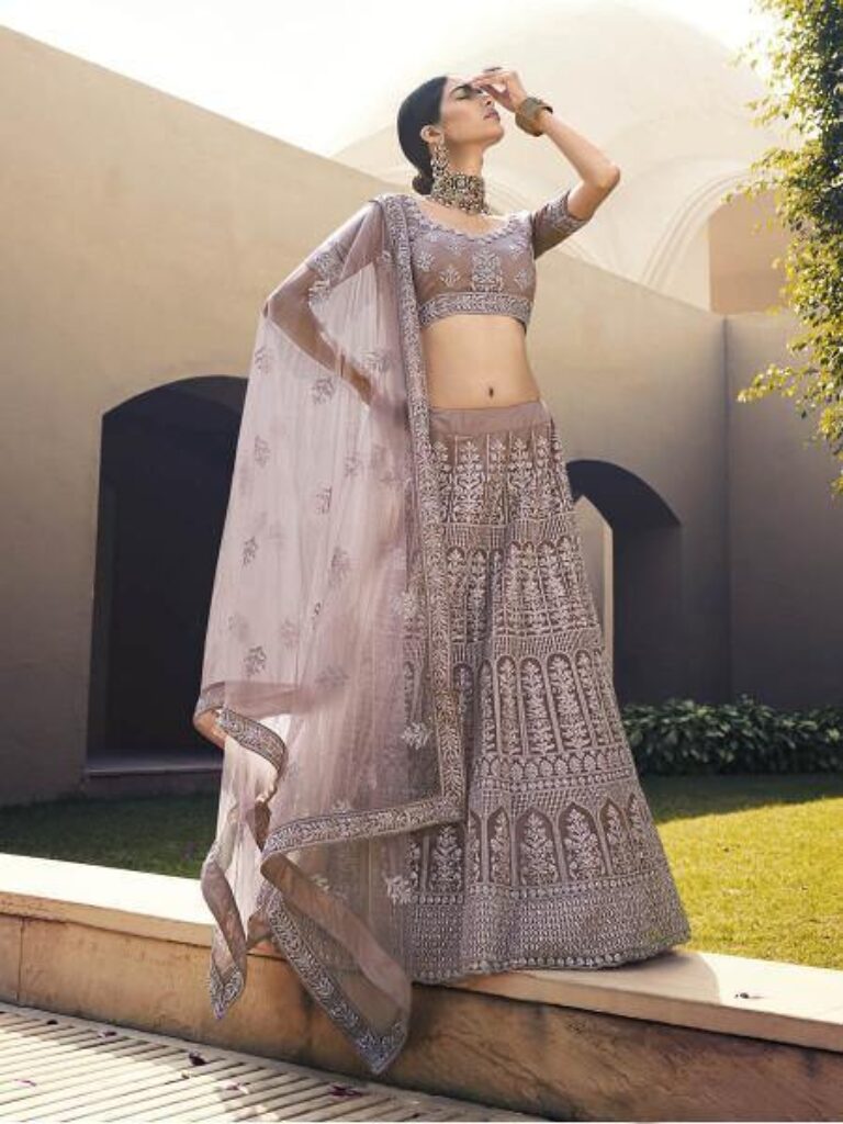 Myra Mauve Heavy Embroidered Soft Net Bridal Lehenga